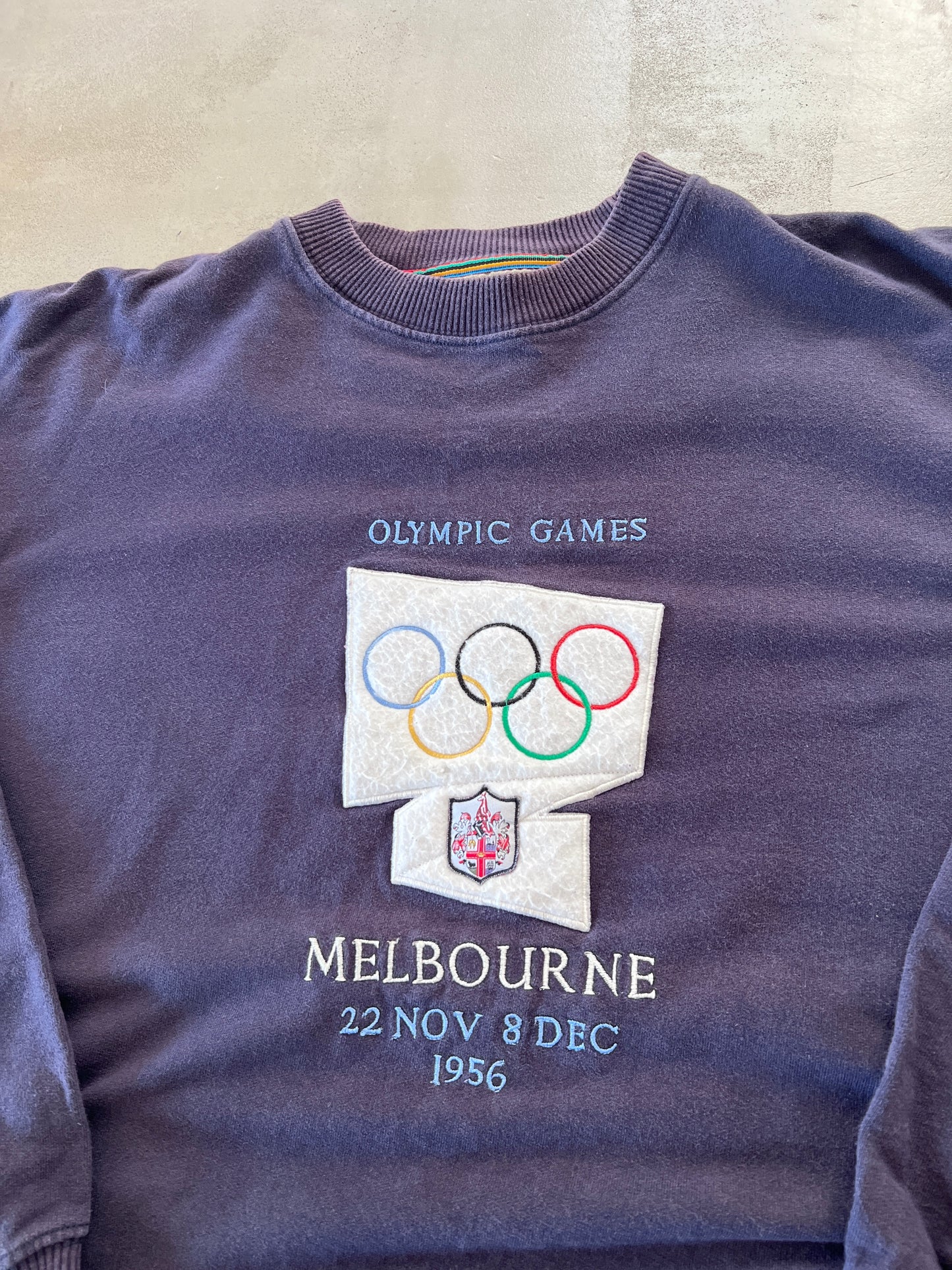 FADED NAVY/PURPLE OLYMPIC GAMES SWEATER - 1990S - L/XL