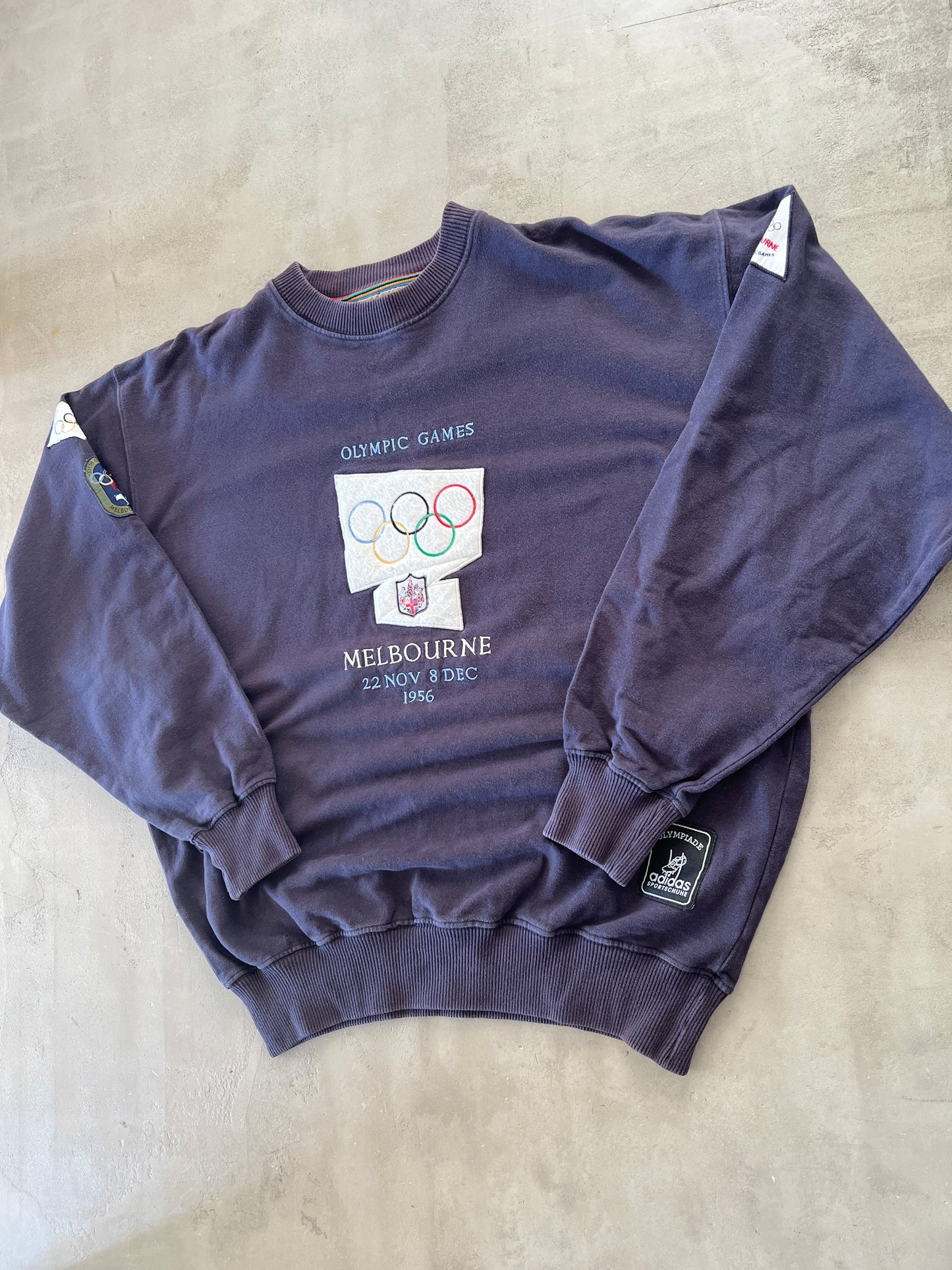 FADED NAVY/PURPLE OLYMPIC GAMES SWEATER - 1990S - L/XL