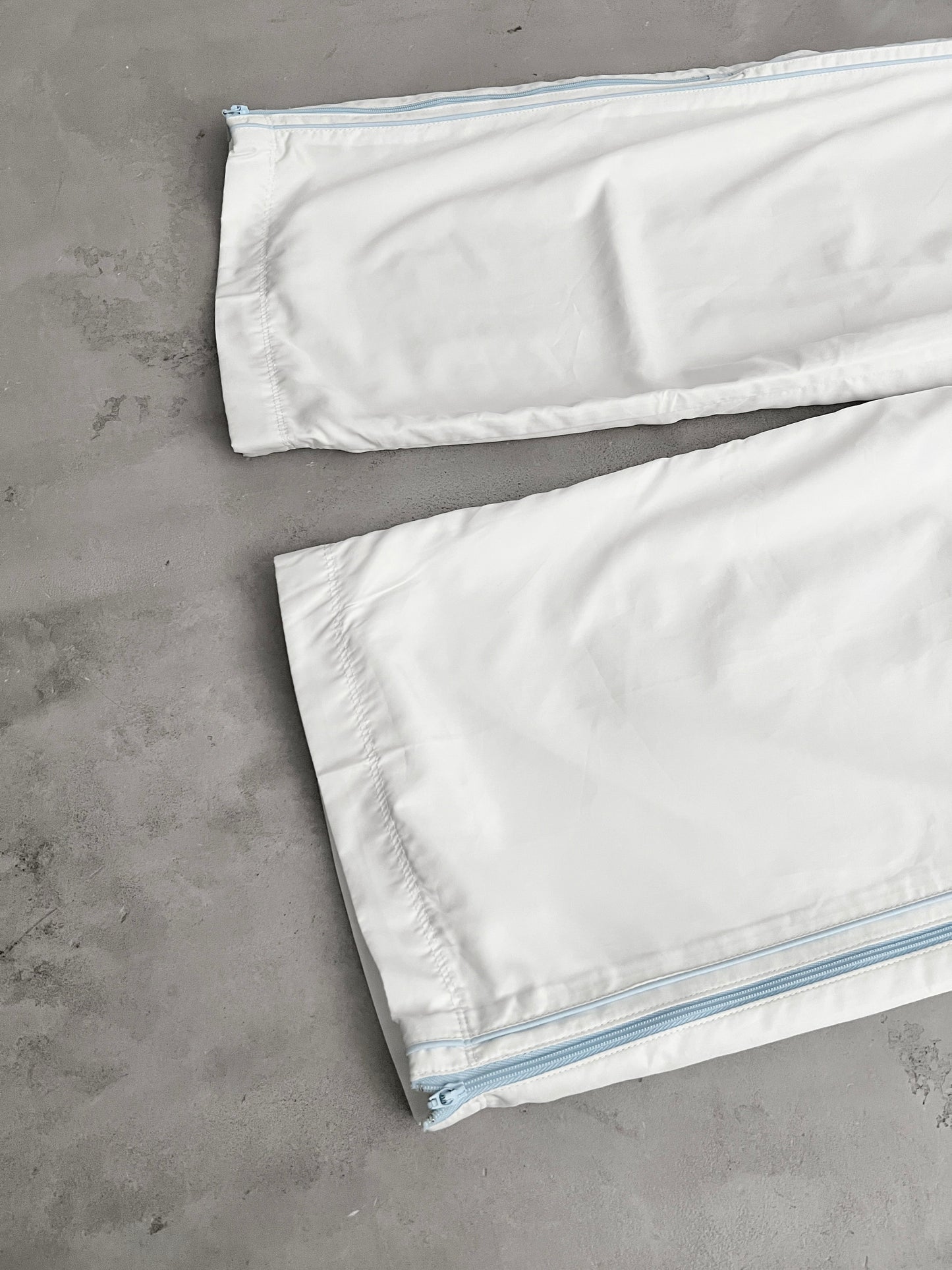 WHITE/BABY BLUE NIKE TRACK PANTS - 2000S - L/XL