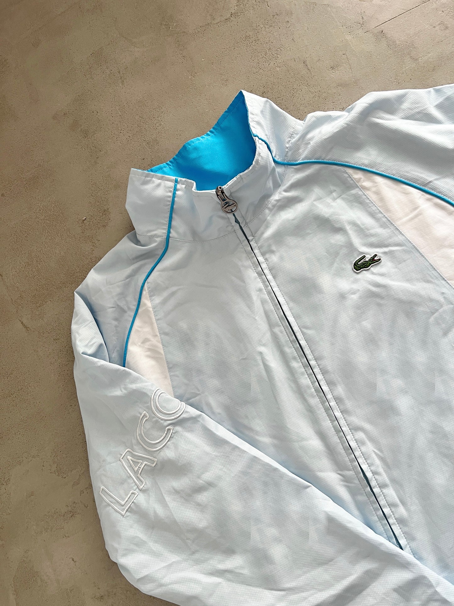 BABY BLUE LACOSTE TRACK JACKET - 2000S - L