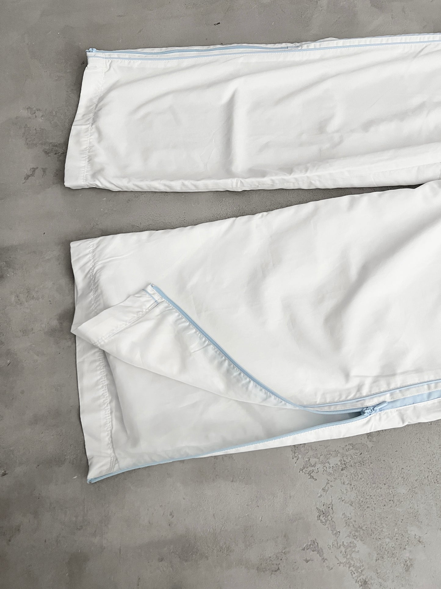 WHITE/BABY BLUE NIKE TRACK PANTS - 2000S - L/XL